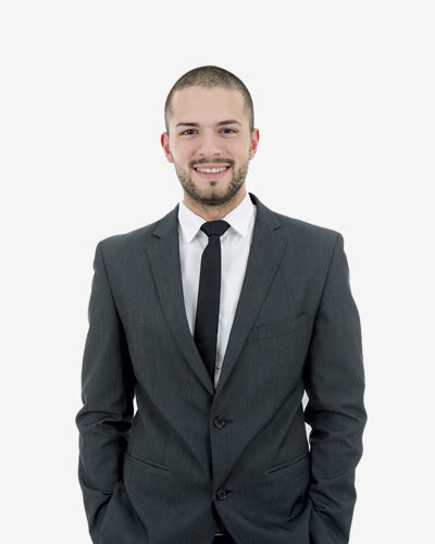 Smiling man in a suit and tie.
